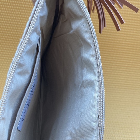 Beach Days Pom Pom Oversized Straw Clutch, Natural zipper closure 
10” x 7” - Picture 5 of 6